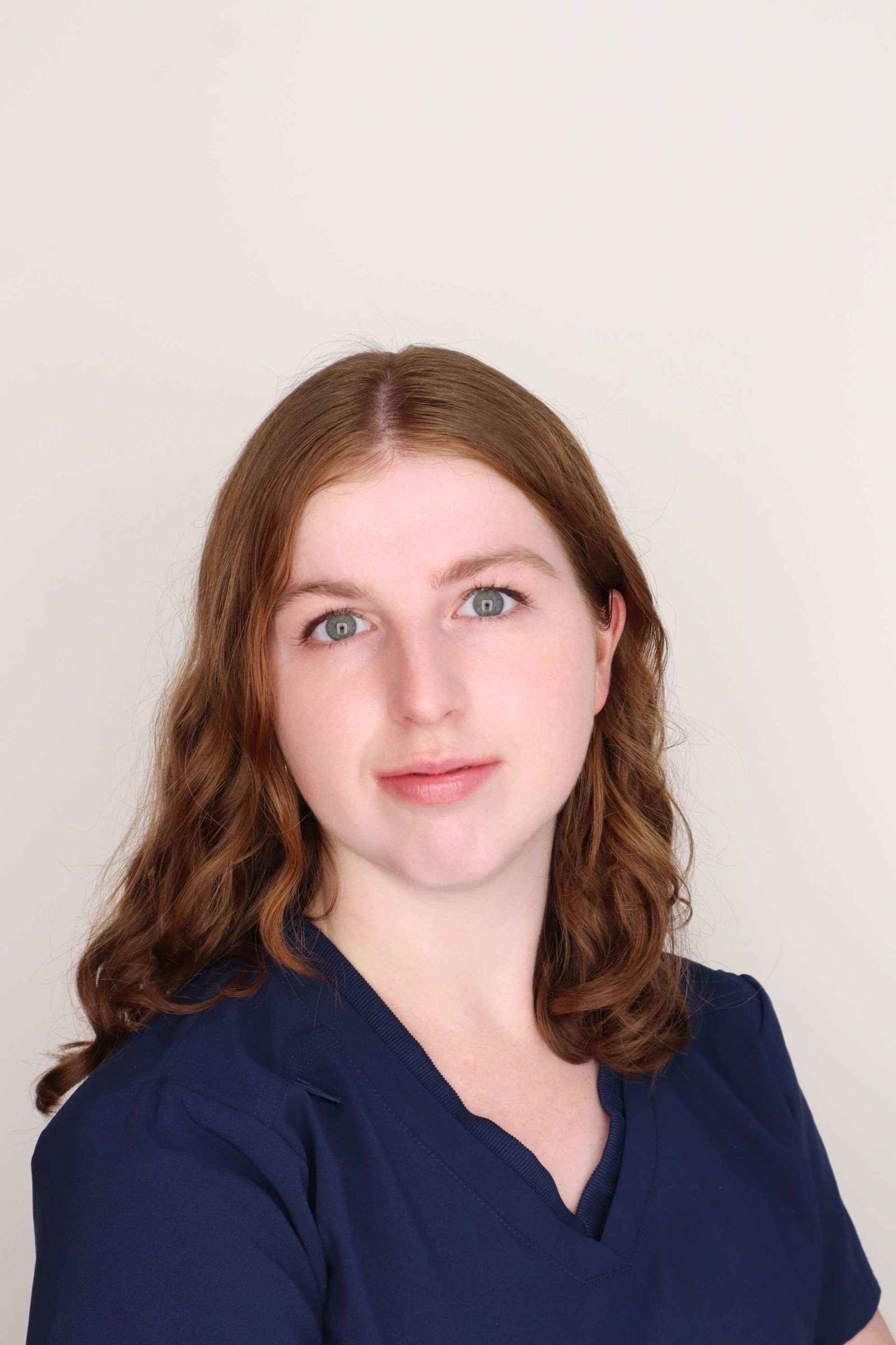 Headshot no smile.jpg