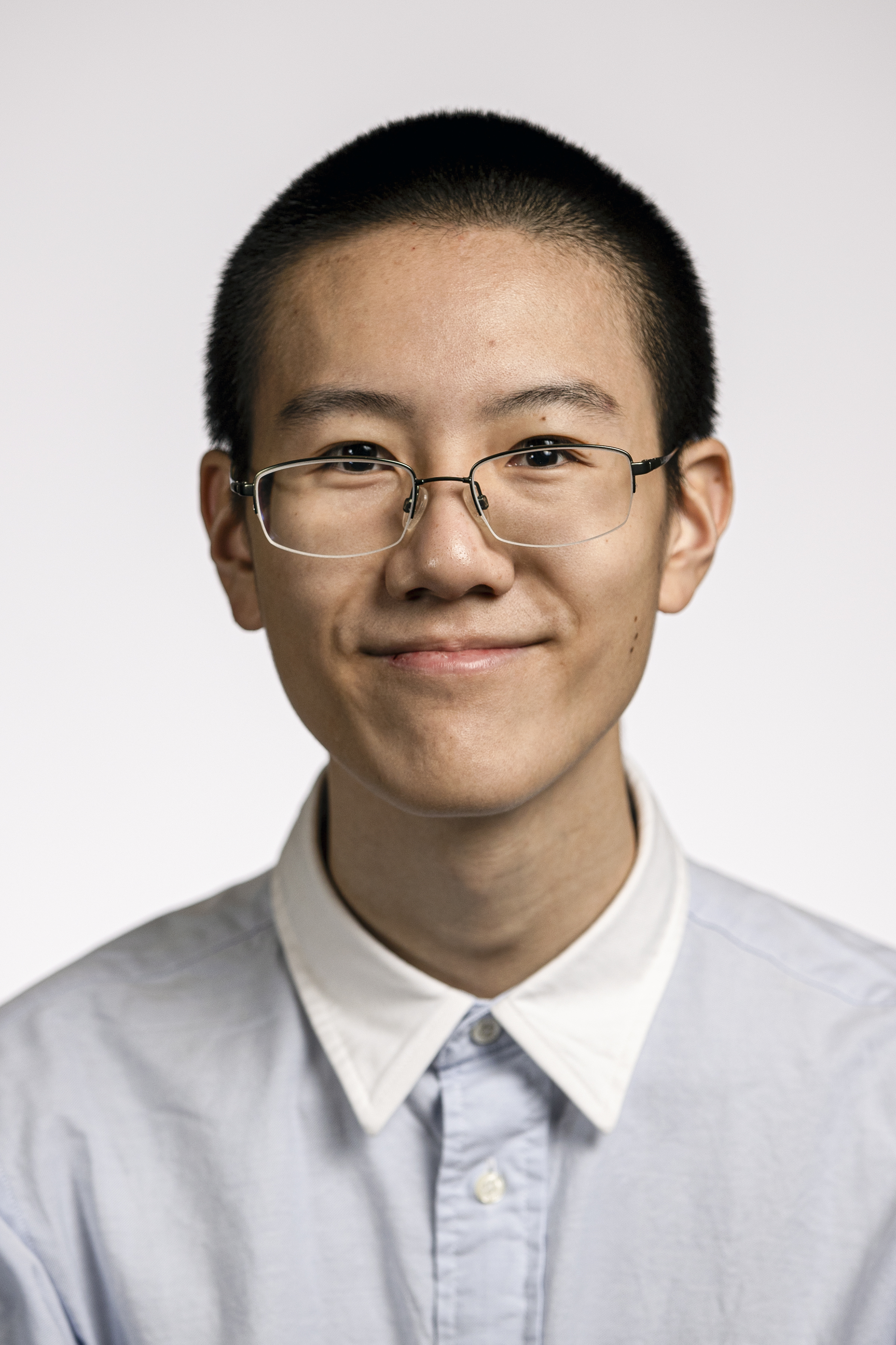 Headshot (Glasses).jpg