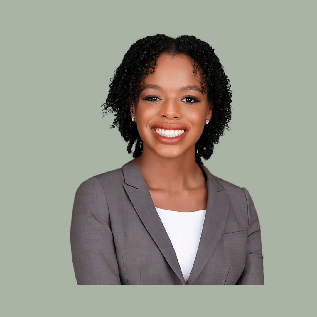 charlize headshot green bg.png